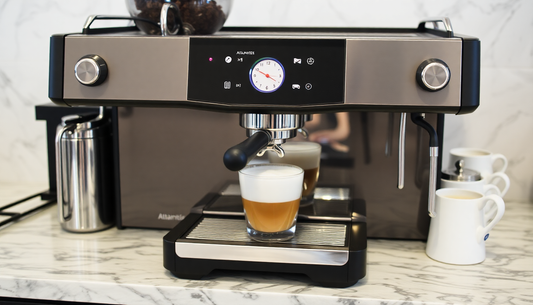 Atlantis coffee machine Indirapuram prices shown with modern espresso maker brewing coffee with frothy milk