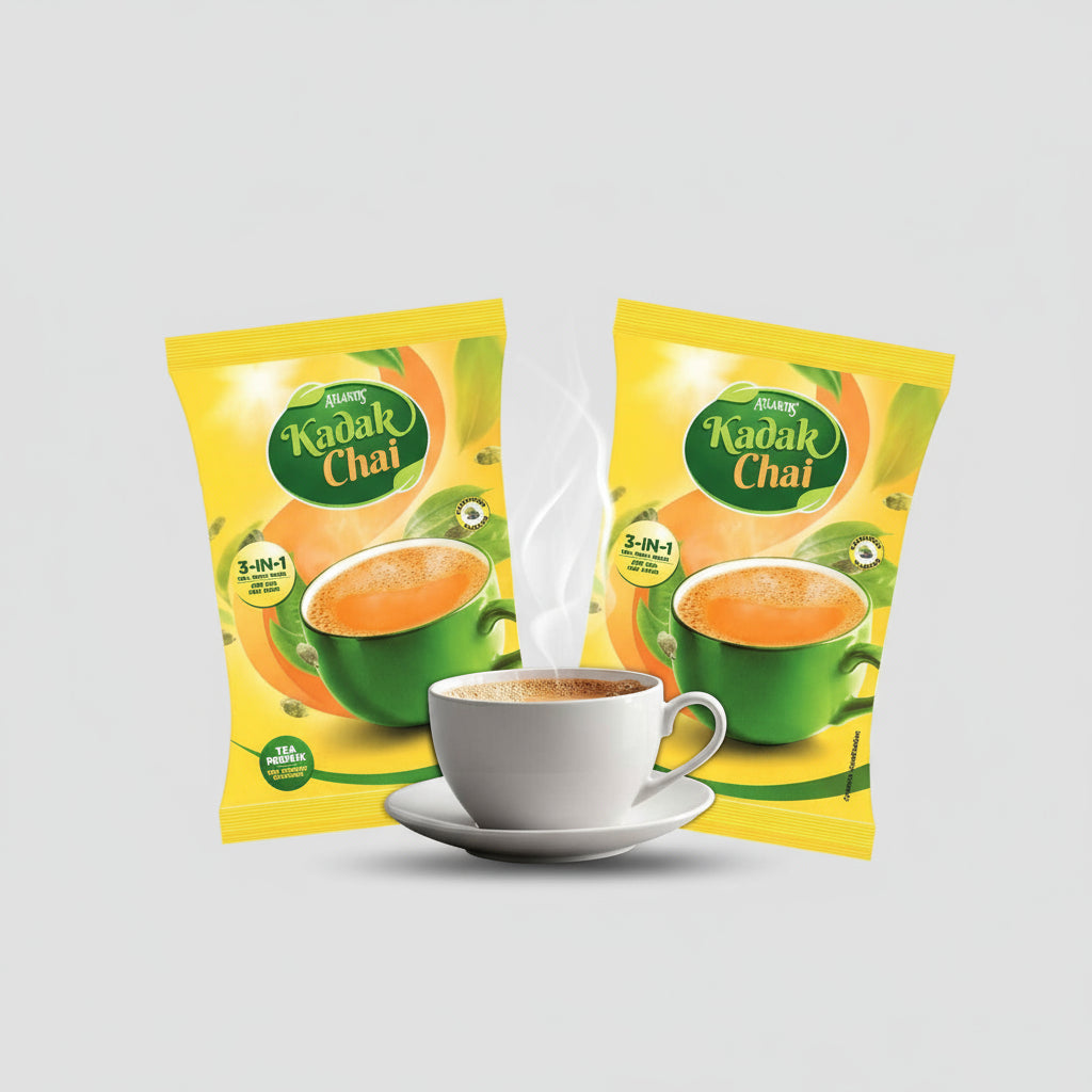 Amazon Atlantis Kadak Tea Premix wholesale packs with steaming cup of rich tea and green leaves background