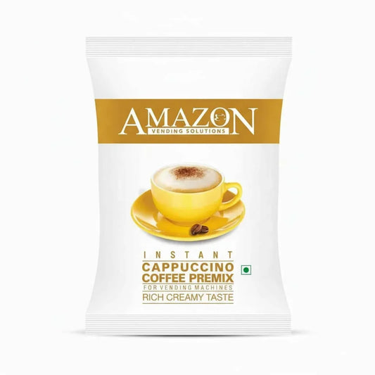 Amazon instant cappuccino powder packet with yellow cup of creamy cappuccino and coffee beans