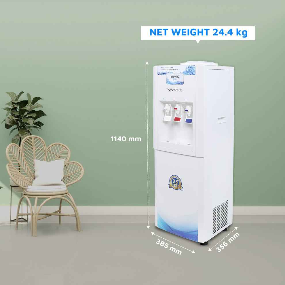 White Atlantis super water dispenser with three taps next to a wicker chair and plant in a green room