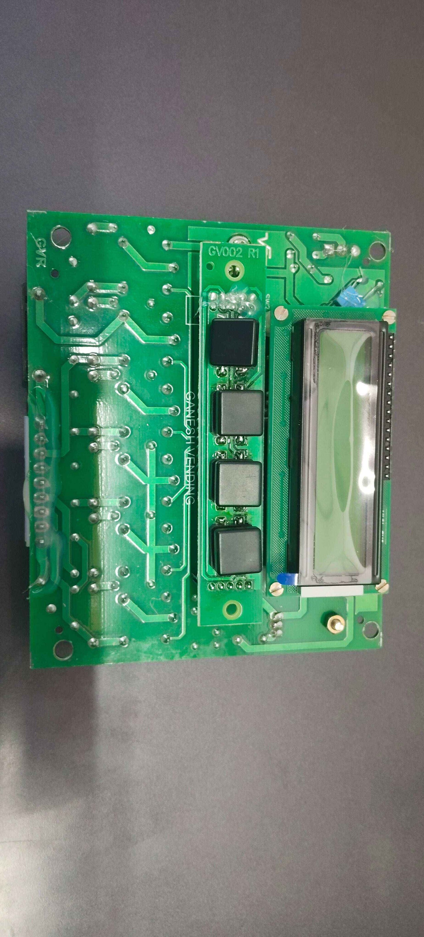 Green circuit board with display screen and buttons for Nescafe tea coffee vending machine