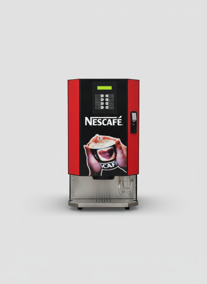 Nescafe coffee machine for office multi 8 option 4 lane on countertop with coffee cup nearby