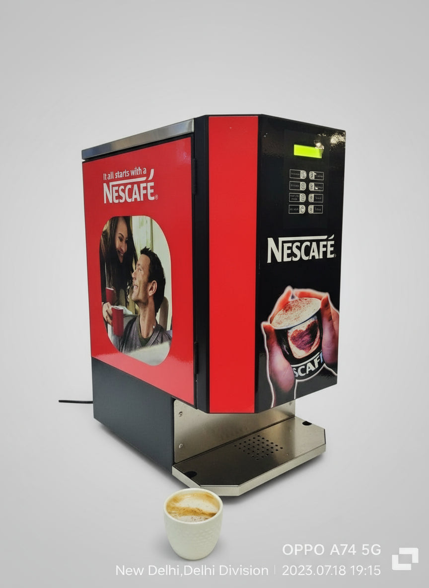 Nescafe coffee machine for office multi 8 option 4 lane in red and black on kitchen counter with coffee cup