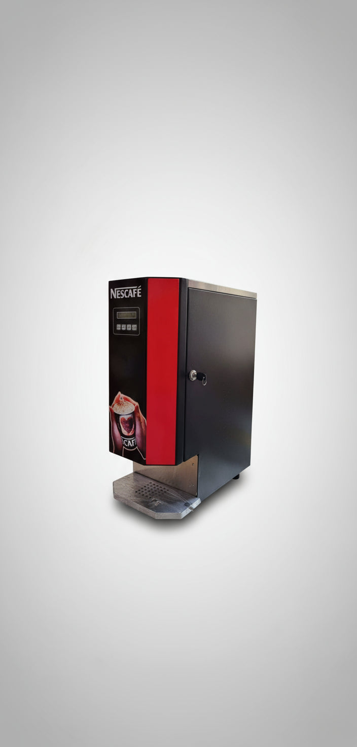Black and red Nescafe coffee machine from Tea coffee vending service on glass table near window