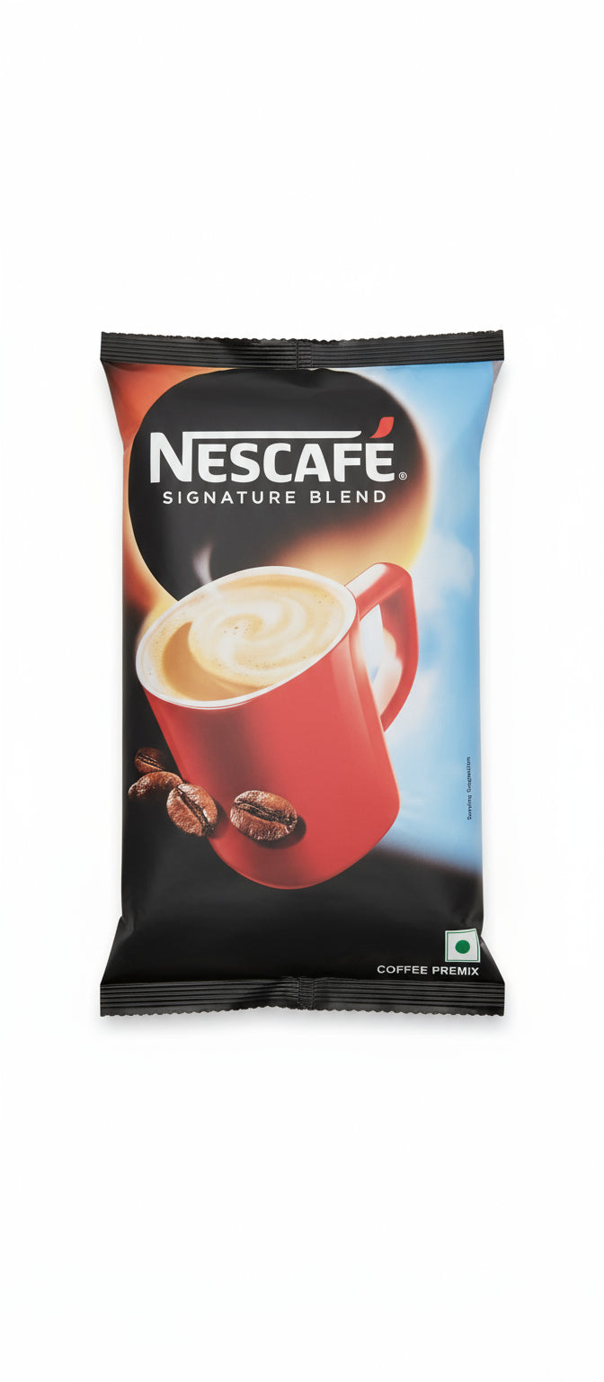 Nescafe Signature Blend 1kg premix pack with red coffee cup and coffee beans on black background