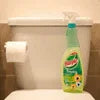 Dettol cleaner bottle placed next to toilet with roll of best tissue paper for office washrooms