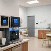 Best coffee machine for hospitals in a clean modern staff break room with multiple brewing options