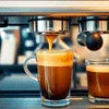 Coffee machine service Ranchi showing espresso being brewed into glass cups from a professional espresso machine