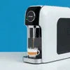 Modern coffee machine in Delhi dispensing coffee into a glass cup