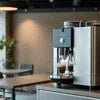 Atlantis coffee machine price in India displayed on modern coffee maker with glass pot