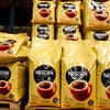 Nescafe Classic 500g wholesale price Noida gold packaging bags stacked on shelf
