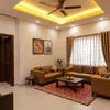 Coffee machine rental Noida Sector 62 service in a cozy living room setting with modern sofa and warm lighting