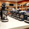 Coffee machines displayed for sale by coffee machine vendor in Gurgaon in a modern showroom