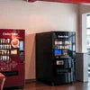 Best tea coffee vending machines in Delhi featuring modern coffee and snack dispensers in office space