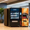 Tea coffee vending machine rental Noida modern office setup with stocked beverages and snacks