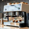Nescafe coffee machine 2 lane benefits with dual spouts dispensing coffee into multiple cups