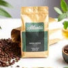 Atlantis coffee machine price Imphal displayed on premium coffee beans bag for brewing