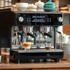 Best vending machine services for cafes Delhi using a professional espresso machine brewing coffee