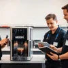 Nescafe coffee machine warranty Delhi NCR service team installing and testing coffee machine
