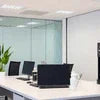 Coffee machine rental in Sahibabad setup in modern office workspace with laptops and meeting table