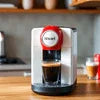 Nescafe machine review and buying guide featuring Nescafe coffee machine brewing espresso at home