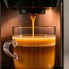 Nescafe Alegria coffee machine brewing fresh espresso shot in clear glass cup buy Nescafe Alegria coffee machine online
