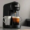 Nescafe coffee machine black variant with black Nescafe coffee machine features brewing espresso in cup
