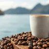 Atlantis Kadak Coffee price in Noida shown with coffee beans and a cup near water