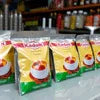 Kadak coffee premix supplier Noida packs displayed on store shelf for instant coffee use