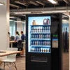 Office coffee vending machine Delhi brand model with multiple coffee options in modern office lounge