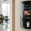 Coffee vending machine Noida model brewing fresh coffee in modern office kitchen
