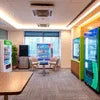 Office coffee vending services Delhi with modern vending machines and seating area in office lounge