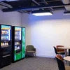 Office vending machines Noida with refrigerated drinks and snacks in a modern office break area