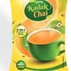 best kadak chai premix India packet with a cup of hot chai brewed in green cup