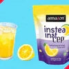 Amacert instant lemon tea premix for vending machines with a glass of iced lemon tea and lemon slices