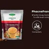Greenfield cardamom tea premix for vending machines pack with cup of tea and cardamom pods