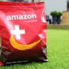 Amazon Plus coffee premix 1kg Noida deals pack placed on grass outdoors