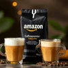 Amazon cappuccino coffee premix supplier Noida black pack with two glasses of cappuccino and coffee beans