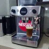 Nescafe coffee machine supplier Guwahati espresso model with cup on countertop