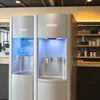 Atlantis water dispenser for offices stainless steel dual tap model in modern office kitchen