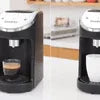 Godrej coffee vending machine Delhi black model brewing fresh coffee in modern kitchen