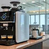 Nescafe Coffee Machine Rental in Gurgaon modern black and white coffee machine setup in office kitchen
