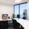 Atlantis Classic 4 Lane Office coffee machine in a modern office meeting room setup