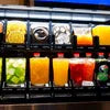 Atlantis Neo 4 Lane beverage vending machine with various colorful drink options