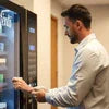 Man using Nescafe coffee machine 3 lane price vending machine for coffee dispensing