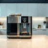Atlantis Coffee Machine UNDER 15000 sleek black model on kitchen counter for home use