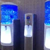 Atlantis Select water cooler dispensers with illuminated blue water bottles