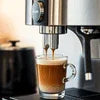 Amazon Premixes Atlantis Coffee Machine Supplier Noida preparing fresh espresso in glass cup