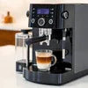 Atlantis coffee machine Sector 18 Noida black espresso maker with cup and milk frother