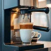 Coffee premix supplier Sector 62 Noida near me fresh coffee brewed in espresso machine with cup